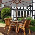 Four Seater Circular Table and Four Chairs Dining Set