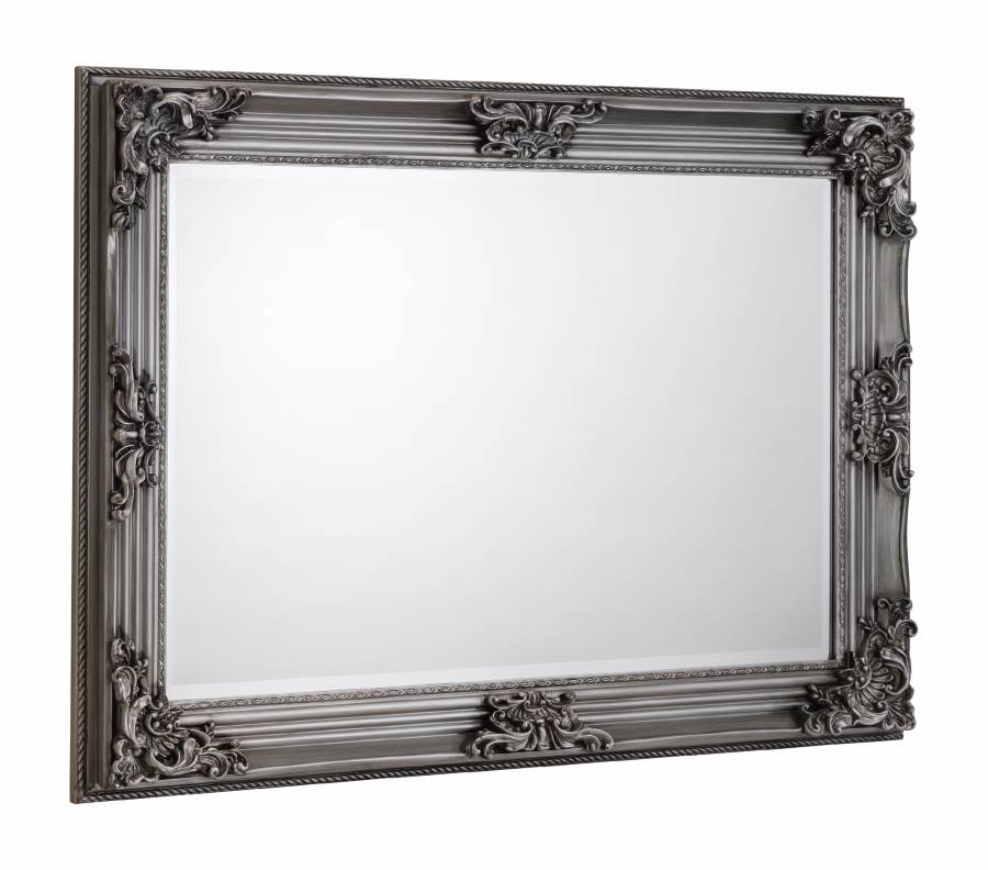 Rococo wall mirror placed on a white background